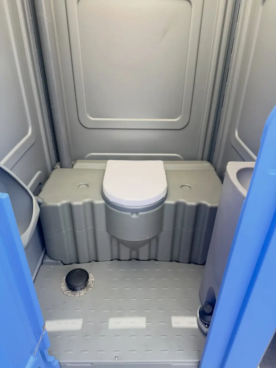 Interior of a wheelchair-accessible portable restroom